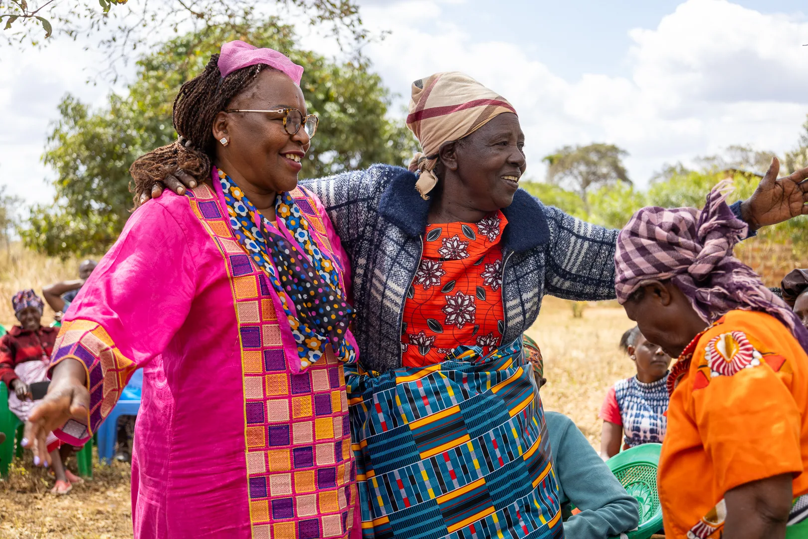 Hon. Nancy Kavinya Kioko and a community member meeting during outreach