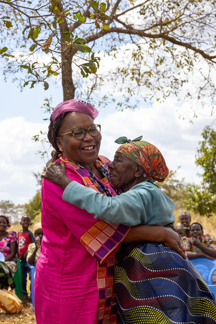 Hon. Nancy Kavinya Kioko embracing a community member at a local gathering