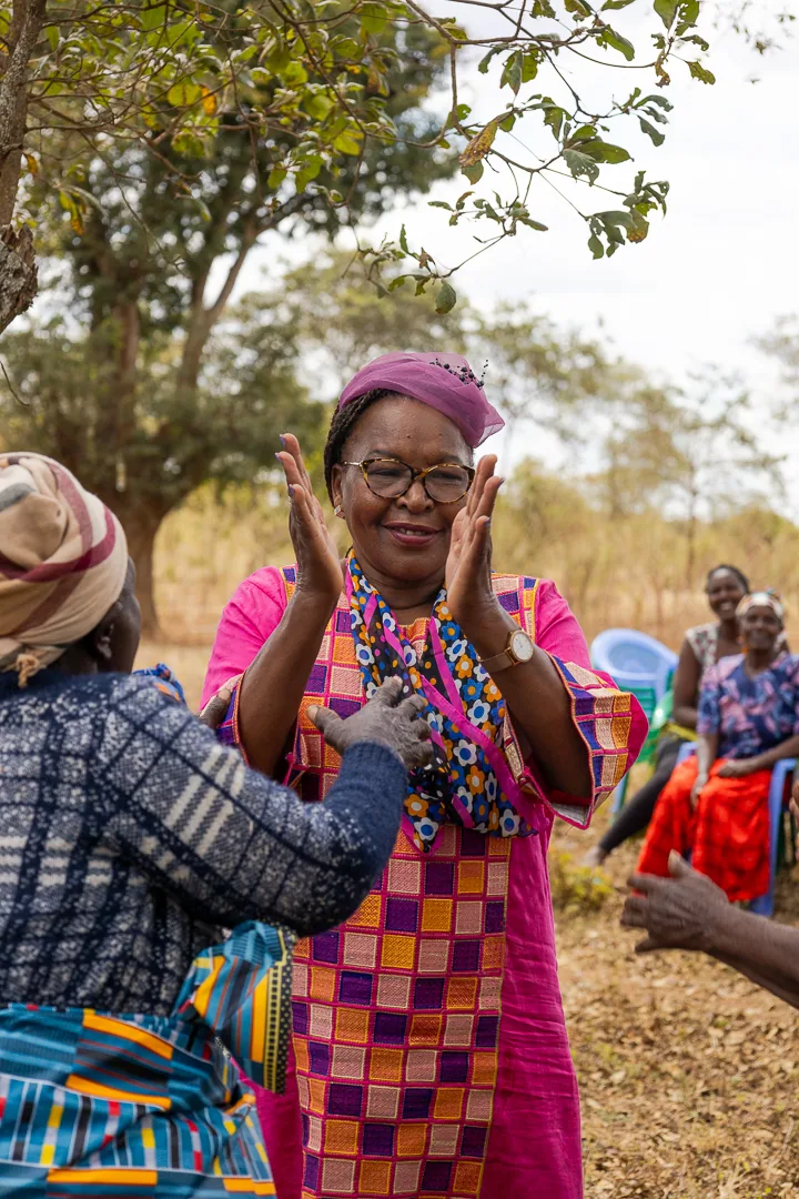 Hon. Nancy Kavinya Kioko greeting a woman during a community visit