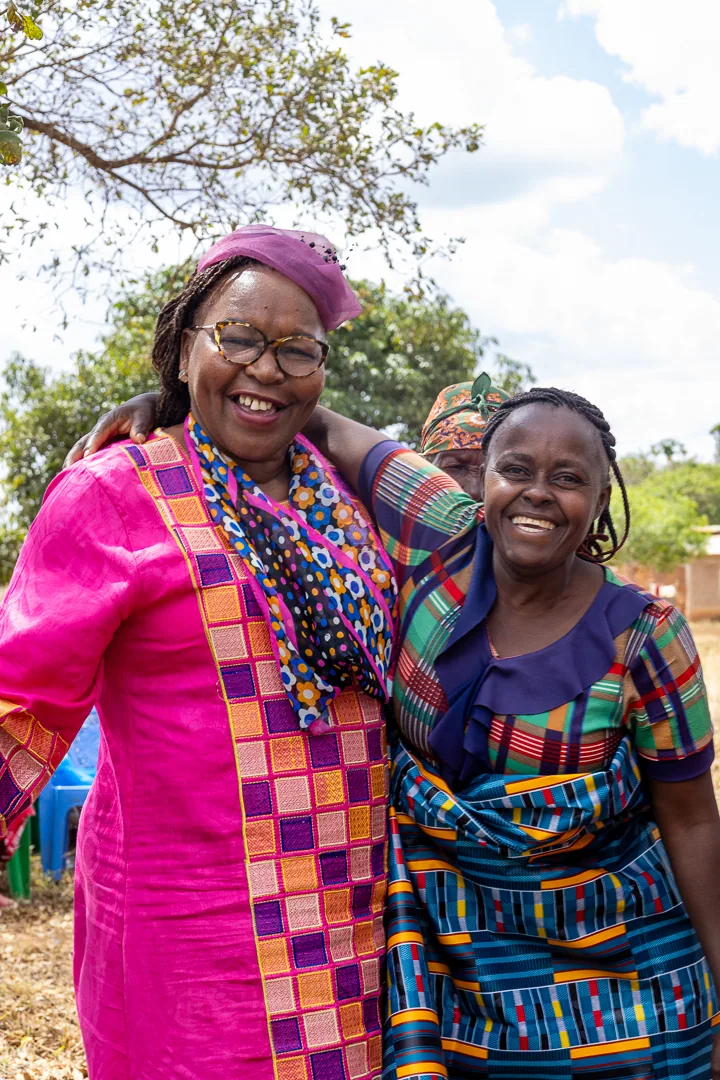 Hon. Nancy Kavinya Kioko standing alongside a community member